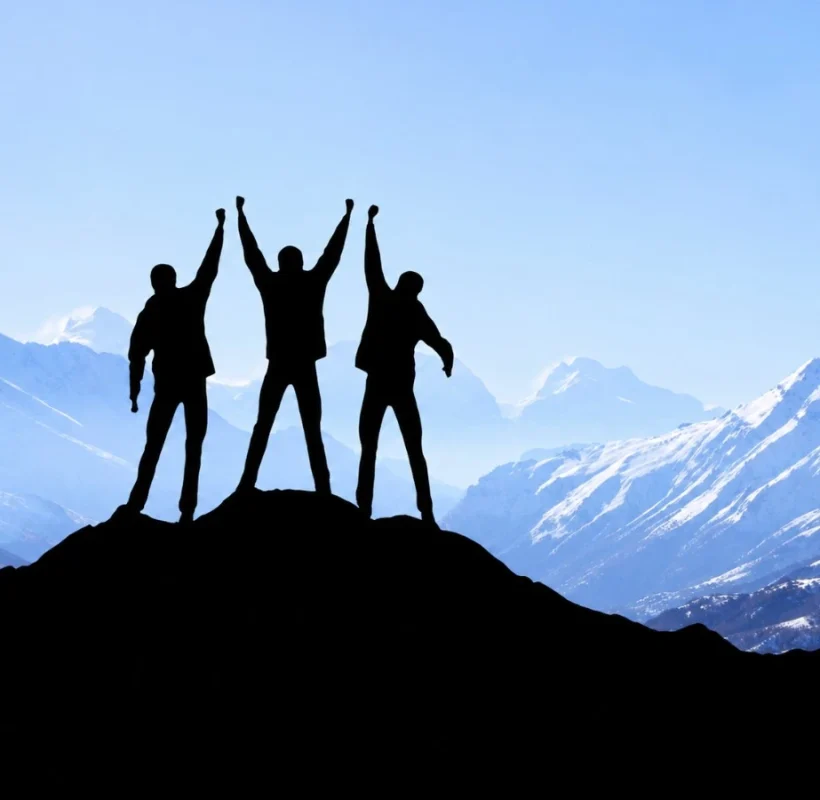 Triumphant Hikers Above Snowy Peaks-150kb